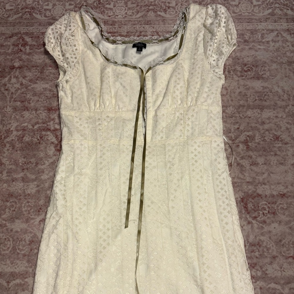 Beverly and Beck Elegant White Lace Dress with Green String Detail